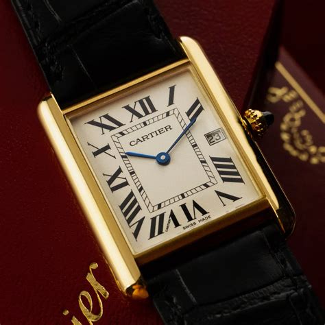 cartier tank watch with date.